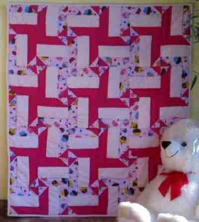 Pink handmade baby quilt