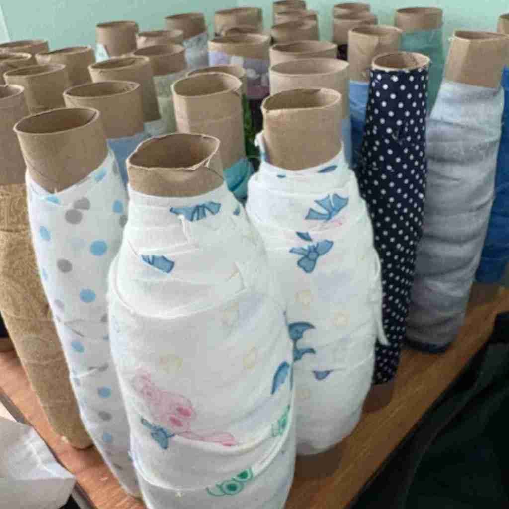 paper towel rolls on a dowl rod holder