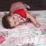 cherished moments with baby on quilt or mat